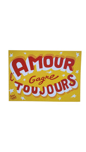 Carte postale "l'Amour gagne toujours" jaune Toqué Frères